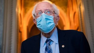 Sen. Bernie Sanders, I-Vt., is seen outside the chamber as the Senate debates the coronavirus relief package on Friday, March 5, 2021.