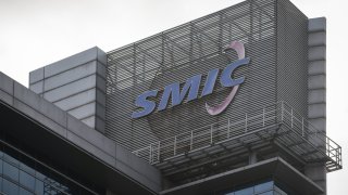 A Semiconductor Manufacturing International Corp. (SMIC) signage atop the company’s headquarters in Shanghai, China, on Saturday, Dec. 19, 2020. SMIC is one of China’s most important chipmakers.