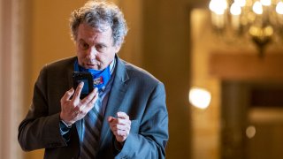 Sen. Sherrod Brown (D-OH) takes a call at the US Capitol on March 06, 2021 in Washington, DC.