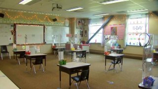 A classroom with desks spaced out due to COVID-19 protocols.