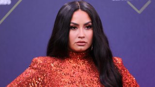 In this Nov. 15, 2020, file photo, Demi Lovato arrives at the 2020 E! People's Choice Awards held at the Barker Hangar in Santa Monica, California.