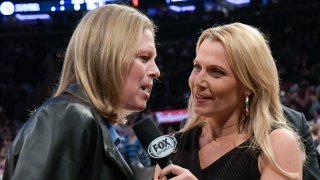 NEW YORK, NY - MARCH 15: Fox Sports reporter Lisa Byington, right, interviews Big East Commissioner Val Ackerman during the semifinals of the Big East Basketball Tournament at Madison Square Garden on March 15, 2019 in New York City.