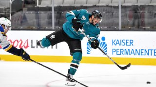 SAN JOSE, CA – MARCH 08: Evander Kane #9 of the San Jose Sharks scores the game-winning goal in overtime against the St. Louis Blues at SAP Center on March 8, 2021 in San Jose, California. (Photo by Brandon Magnus/NHLI via Getty Images)