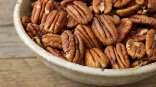 Bowl of pecan nuts.