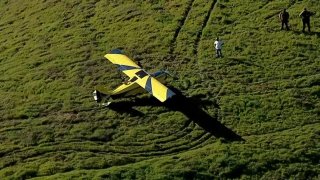 A plane at rest after landing on a hillside in the East Bay.