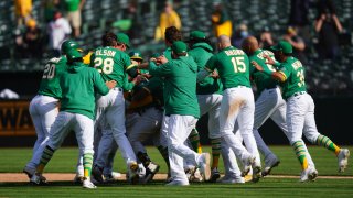 Ramon Laureano of the Oakland Athletics celebrates with his teammates.