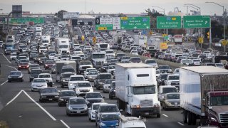 Vehicles in traffic travel along Interstate 80 in Emeryville, California, U.S., on Thursday, Sept. 27, 2018.