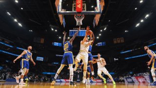 Luka Doncic #77 of the Dallas Mavericks looks to pass the ball during the game against the Golden State Warriors on April 27, 2021 at Chase Center in San Francisco, California.