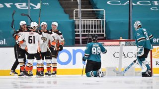 The Anaheim Ducks celebrate after scoring against the San Jose Sharks.