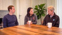Mark Zuckerberg and Priscilla Chan sit at their dining room table with biophysicist Joe DeRisi