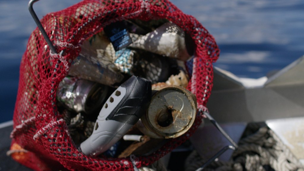 A mesh bag filled with trash and other debris found in Lake Tahoe.