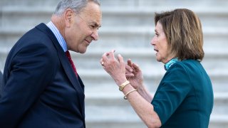 U.S. Senate Majority Leader Chuck Schumer (D-NY) talks with Speaker of the House Nancy Pelosi (D-CA) on the steps of the U.S. Capitol.