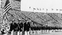 Ralph Craig, center, of Albany, N.Y., who won the 100- and 200-meter dashes in the 1912 Olympic games