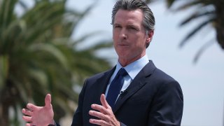 FILE - California Gov. Gavin Newsom talks during a news conference at Universal Studios in Universal City, Calif., on June 15, 2021.