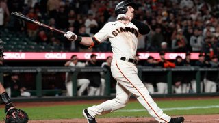 SAN FRANCISCO, CALIFORNIA – JUNE 15: Mike Yastrzemski #5 of the San Francisco Giants swings and watches the flight of his ball as he hits a grand slam home run against the Arizona Diamondbacks in the bottom of the eighth inning at Oracle Park on June 15, 2021 in San Francisco, California. The Giants won the game 9-8. (Photo by Thearon W. Henderson/Getty Images)