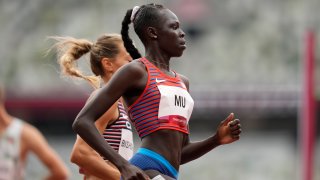 Athing Mu, of United States, wins a heat in the women's 800-meter run