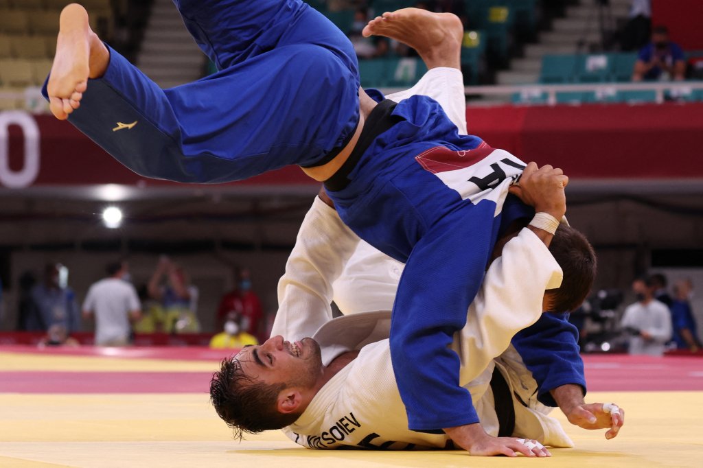 Azerbaijan's Zelym Kotsoiev and France's Alexandre Iddir compete