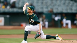 OAKLAND, CALIFORNIA – JUNE 30: Chris Bassitt #40 of the Oakland Athletics pitches in the top of the first inning against the Texas Rangers at RingCentral Coliseum on June 30, 2021 in Oakland, California. (Photo by Lachlan Cunningham/Getty Images)