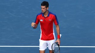 Novak Djokovic competes in Tokyo