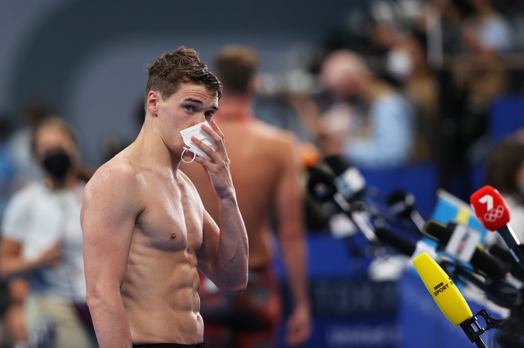 Michael Andrew of Team USA is interviewed after competing in heat five of the Men's 100m Breaststroke on July 24, 2021 in Tokyo, Japan. 