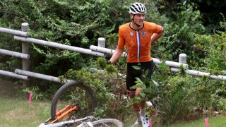 Mathieu van der Poel of Team Netherlands suffers a fall after jumps off a boulder