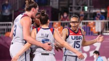 Allisha Gray, Kelsey Plum, Stefanie Dolson and Jacquelyn Young of Team United States celebrate victory in the 3x3 Basketball competition on day three of the Tokyo 2020 Olympic Games at Aomi Urban Sports Park on July 26, 2021 in Tokyo, Japan.