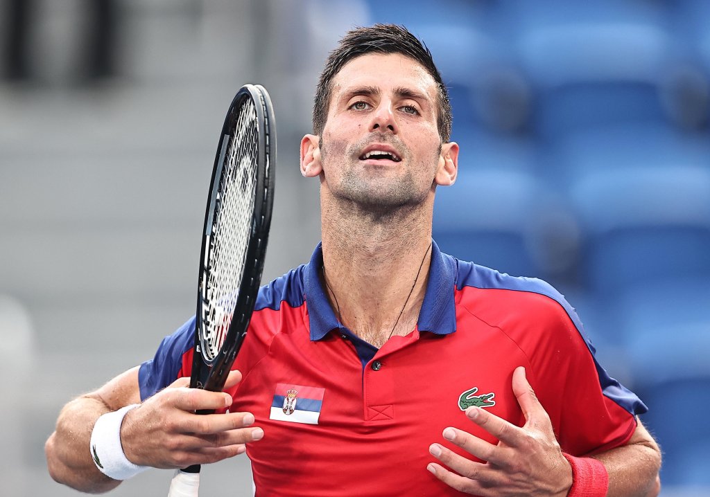Novak Djokovic of Serbia reacts against Alejandro Davidovich Fokina of Spain during the Men's Singles Third Round Tennis Match on day five of the Tokyo 2020 Olympic Games at Ariake Tennis Park on July 28, 2021 in Tokyo, Japan.