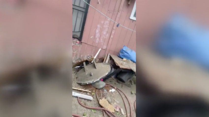 A 2,000 pound piece of debris sits in a South LA neighborhood where fireworks exploded on Wednesday, June 30, 2021.