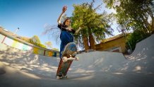 Skateboarder demonstrating an ollie