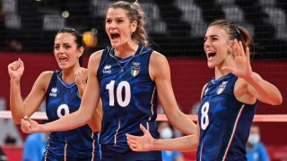 Italy's Caterina Bosetti, Cristina Chirichella and Alessia Orro celebrate during Italy's win over Argentina in women's volleyball at the Tokyo Olympics.
