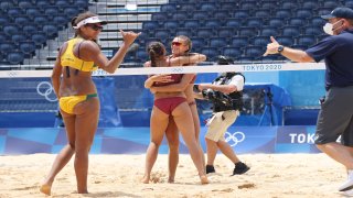 Tina Graudina and Anastasija Kravcenoka of Latvia celebrate after defeating Team Brazil.