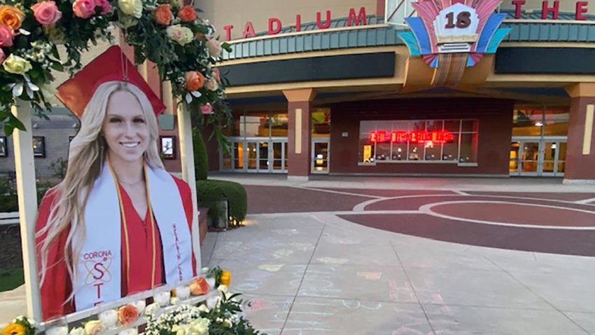 Messages in honor of Rylee Goodrich, 19, and Anthony Barajas, 18, were left outside a movie theater at The Crossings mall in Corona.