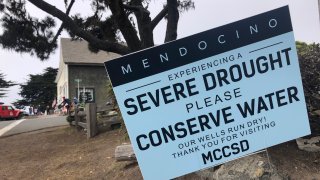 Signs alert visitors to the severe drought in Mendocino, Calif
