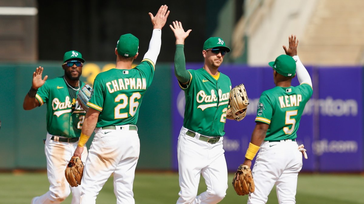 Oakland Athletics center fielder Starling Marte catches a deep fly