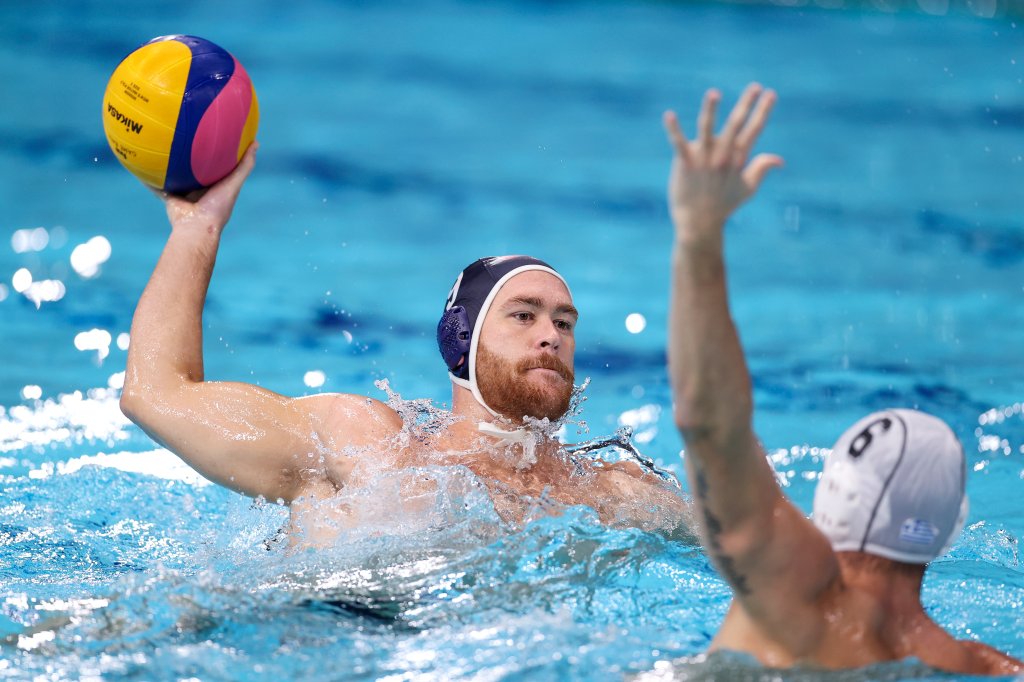 Alex Bowen of Team United States is blocked by Alexandros Papanastasiou of Team Greece during the Men's Preliminary Round Group A match between Greece and the United States on day ten of the Tokyo 2020 Olympic Games at Tatsumi Water Polo Centre on Aug. 2, 2021, in Tokyo, Japan.