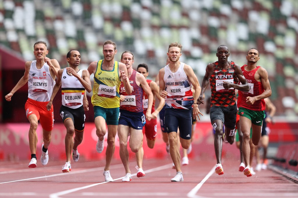 Michal Rozmys of Team Poland, Ismael Debjani of Team Belgium, Oliver Hoare of Team Australia, Cole Hocker of Team United States, Josh Kerr of Team Great Britain, Timothy Cheruiyot of Team Kenya and Abdelatif Sadiki of Team Morocco compete in round one of the Men's 1500m heats on day eleven of the Tokyo 2020 Olympic Games at Olympic Stadium on Aug. 3, 2021, in Tokyo, Japan.