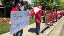 Good Samaritan Hospital nurses protest in front of the facility.