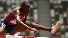 USA's Grant Holloway competes in the men's 110m hurdles semi-finals during the Tokyo 2020 Olympic Games