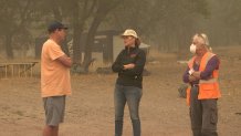 Jennifer Gray Thompson of After the Fire meets with Plumas County Supervisor Kevin Goss, left, and Greenville business owner Ken Donnell.