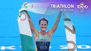 Flora Duffy celebrates earning gold in triathlon.