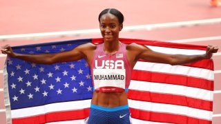 Dalilah Muhammad of Team United States celebrates after winning silver in the Women's 400m Hurdles Final on day twelve of the Tokyo 2020 Olympic Games
