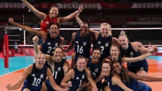 Team United States poses after defeating Team Serbia during the Women's Semifinals on day fourteen of the Tokyo 2020 Olympic Games