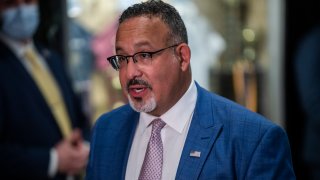 Education Secretary Miguel Cardona speaks to press after a visit to P.S. 5 Port Morris, a Bronx elementary school, Tuesday, Aug. 17, 2021 in New York.