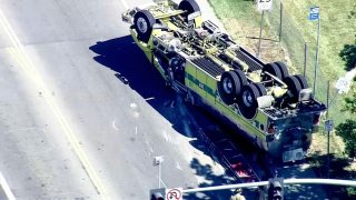 A water tender on its roof after a crash in Oakley.