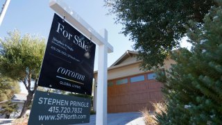 A sign is posted in front of a home for sale on September 28, 2021 in San Anselmo, California.