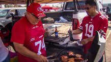 49er fans grilling chicken in the parking lot