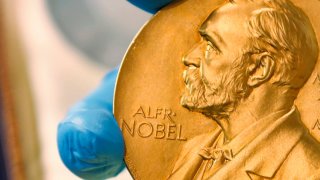 gold Nobel Prize medal