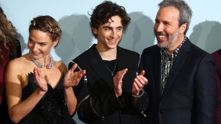 Rebecca Ferguson, from left, Timothee Chalamet, and director Denis Villeneuve poses for photographers upon arrival at the premiere of the film 'Dune'
