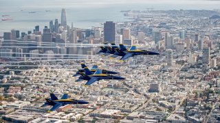 The US Navy Blue Angels fly over San Francisco.