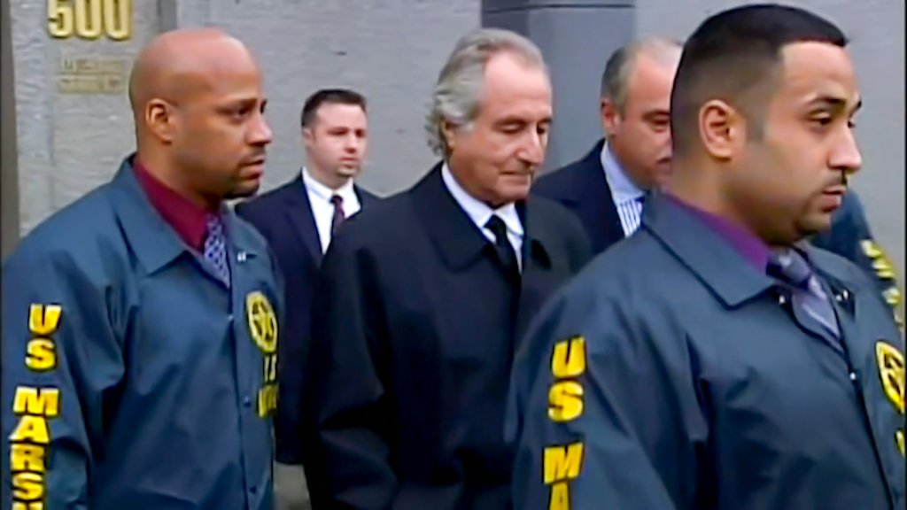 bernie madoff led away from court by US marshals